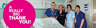 Charitable Funds, Nurses standing behind new bed