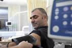 Male Patient having blood pressure checked